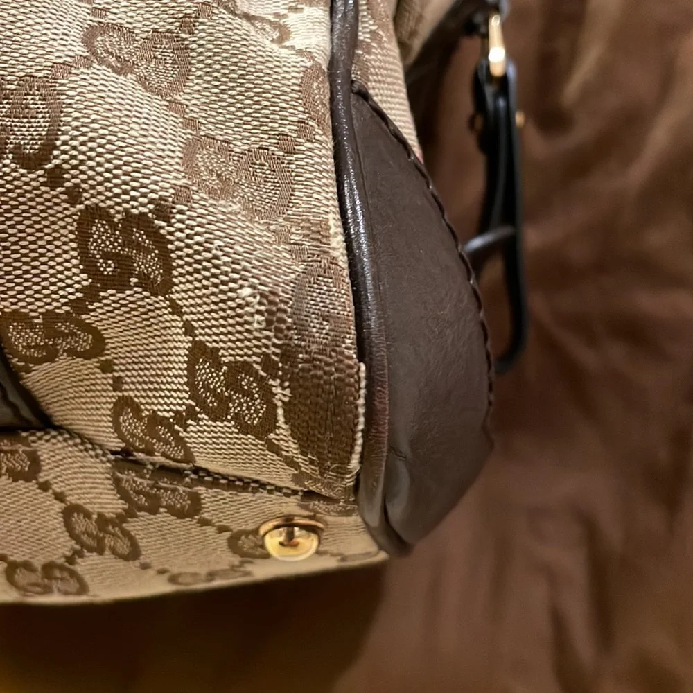 Gucci GG canvas Boston bag with brown and black leather and gold hardware. - Picture 8 of 10